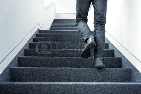 Architektura,Schody, Staircase - 58732641-one-man-walking-upstairs-on-staircase-blue-colorized-picture.jpg